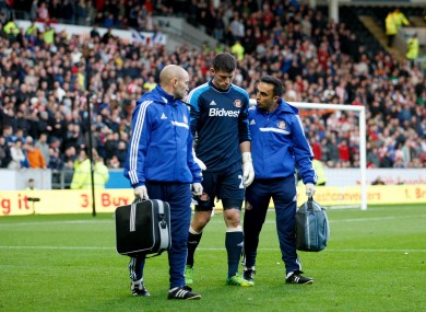 Westwood walks off the pitch at the KC Stadium.