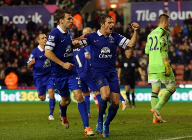 Leighton Baines celebrates his 90th minute penalty.