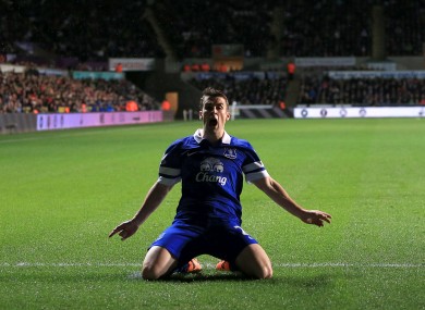 Everton's Seamus Coleman celebrates scoring his side's first goal.