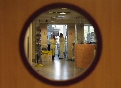 Doctors visit a patient at the intensive care unit of the Queen Fabiola Children's Hospital in Brussels.