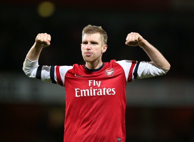 Arsenal's Per Mertesacker celebrates after the final whistle yesterday.