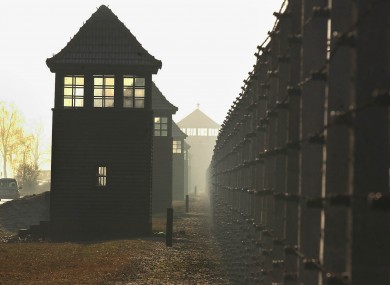 Watchtowers lining the fence in the former Nazi death camp Auschwitz.