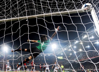 The Genoa goalkeeper fails to save Andrea Pirlo's free-kick.