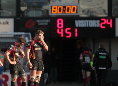 Jason Tovey and Lewis Evans dejected at the final whistle.