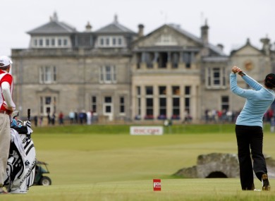 File photo of tournament winner and world number one Mexico's Lorena Ochoa as she tees off from the 18th with the St Andrews clubhouse.