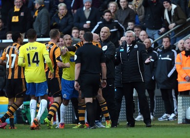 Newcastle United's manager Alan Pardew gestures after confronting Hull City's David Meyler.