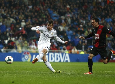 Gareth Bale strokes home his second goal.