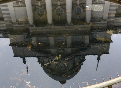 Government Buildings reflected in a fountain in front in the main courtyard.