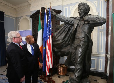 The Tánaiste and Congressman John Lewis admire a statue of Frederick Douglass at Iveagh House last night