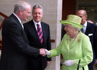 Martin McGuinness and Queen Elizabeth II shake hands at the Lyric Theatre in Belfast in 2012.
