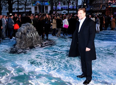 Russell Crowe standing on a very convincing 'flood look' carpet.