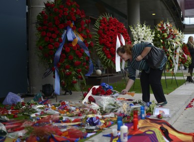 Barcelona football club fan memorabilia is displayed at Camp Nou Stadium, as tributes are placed for FC Barcelona soccer former coach, the late Tito Vilanova.