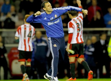 Sunderland boss Gus Poyet punches the air.