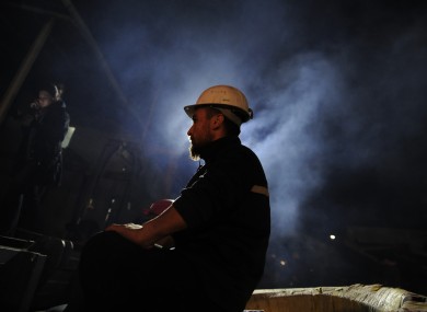 A Turkish miner at the entrance of the coal mine in Soma, Turkey