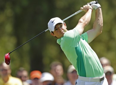 McIlroy watches his tee shot on the fourth hole during the second round of the Wells Fargo Championship.