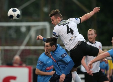 Andy Boyle heads on goal during last night's match.
