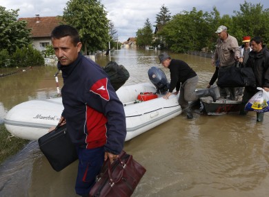 Bosnian people being rescued during the worst flooding the country had seen in a century (May 2014).
