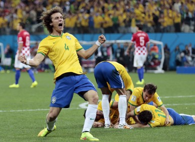 Luiz celebrates during Brazil's game with Croatia.