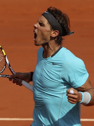 Rafael Nadal reacts as he wins the second set against Serbia's Novak Djokovic.