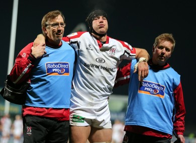 Ferris is helped off the pitch during a league game against Edinburgh in 2012.