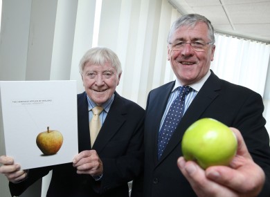 Michael Hennerty and Tom Hayes. With an apple.