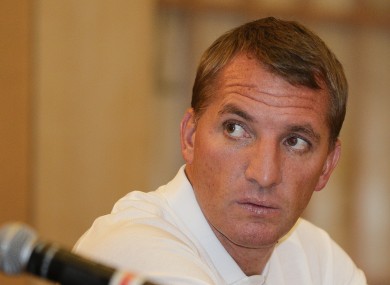 Liverpool manager Brendan Rodgers answers questions during a news conference.