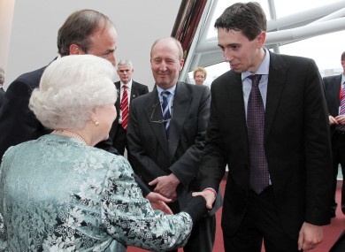 Simon Harris and the Queen, during her 2011 State visit.