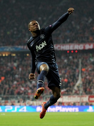 Patrice Evra celebrates his thunderbolt against Bayern Munich this season.