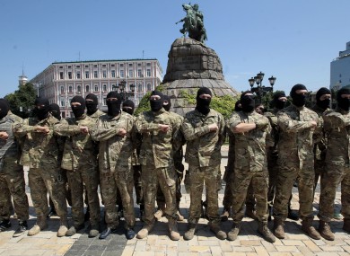 Volunteers in in Kiev yesterday taking an oath of allegiance to Ukraine, before being sent to the eastern part of Ukraine to join the ranks of special battalion