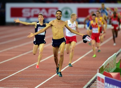 France's Mahiedine Mekhissi-Benabbad takes his shirt off in the Men's Steeplechase Final.