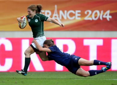 Grace Davitt bursts towards the French line for her try on the stroke of half-time.