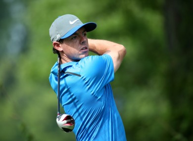 World number one Rory McIlroy is in front. But barely.