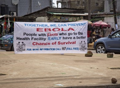 A banner in Sierra Leone encouraging those suffering from Ebola to go to the health centre.