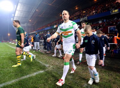 Liam Finn leads out the Ireland team against Australia in the Rugby World Cup last year.