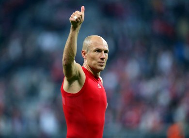 Bayern Munich's Arjen Robben salutes the fans after the final whistle.
