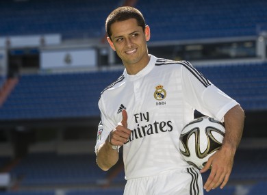 Mexico's international soccer player Javier Hernandez 'Chicharito', poses during his official presentation at the Santiago Bernabeu stadium in Madrid.