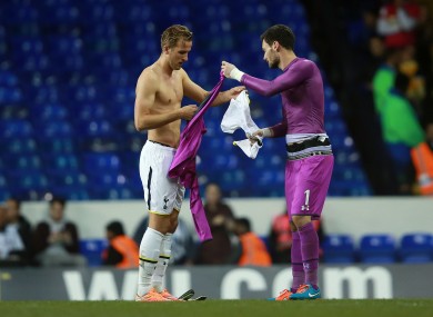 Tottenham's Harry Kane swaps shirts to go in goal after Hugo Lloris is sent off.