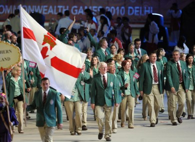 Northern Ireland team carry their flag at the Commonwealth Games.