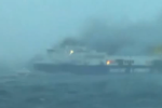One body recovered as hundreds still trapped aboard burning ferry
