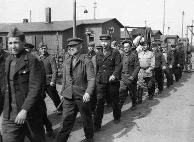 Russian prisoners of war leave their stalag (prison camp) in March 1945 after the camp was liberated.