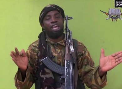 In this photo taken from video by Nigeria's Boko Haram terrorist network, Monday May 12, 2014 shows their leader Abubakar Shekau speaking to the camera.