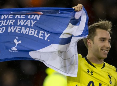 Tottenham's Christian Eriksen celebrates with teammates after his team's English League Cup Semi-Final victory over Sheffield United.