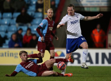 Scunthorpe United's Paddy Madden (left) and Chesterfield's Ritchie Humphreys in action