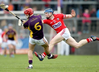 Cork's Conor Lehane in action against Wexford's Lee Chin.