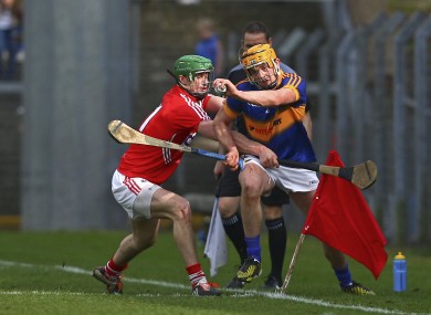 Cork's Seamus Harnedy and Tipperary's Ronan Maher challenging today.