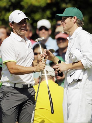 Horan, right, caddied for McIlroy at Augusta last month.