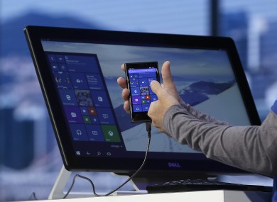 Joe Belfiore, Microsoft Corporate Vice President of Operating Systems Group, demonstrates Continuum for phones at the Microsoft Build conference in San Francisco last month.