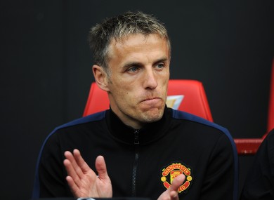 Neville will need to brush up on his Spanish.