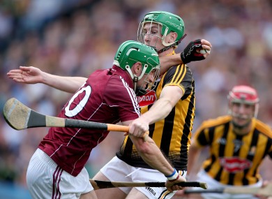 David Burke attempts to barrel through Kilkenny's Joey Holden.
