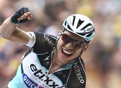 Germany's Tony Martin celebrates as he crosses the finish line to win the fourth stage of the Tour de France.